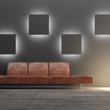 Dunkle Wand mit LED-Lichtelementen | Mooswand